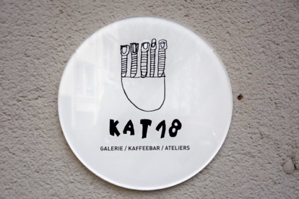KAT18 logo at the entrance to the art gallery and coffee shop, co-conceived with artists. Photo: Marcus Weisen